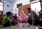 Hari-Jadi-YKB-ke-46,-Kapolres-Bojonegoro-Beri-Hadiah-Laptop-Bocah-Jago-Perbaiki-Elektronik